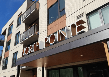 Exterior of North Pointe homes showing the building signage