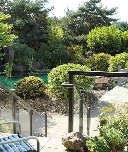 A patio looking out onto a pond in a Patio Home