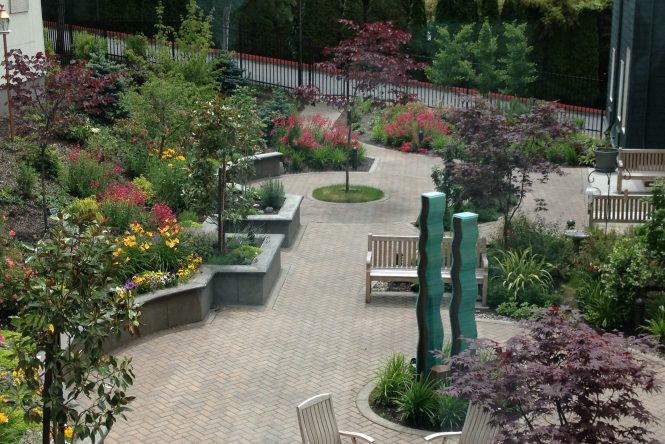 Harmony garden with black-eyed susan flowers and sculptures
