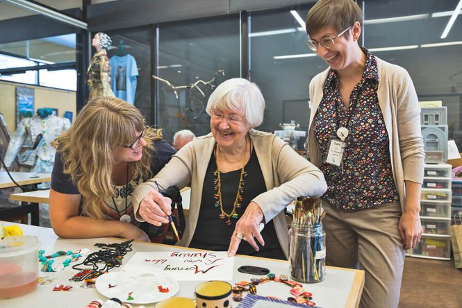 An artworks therapy session with staff and a resident